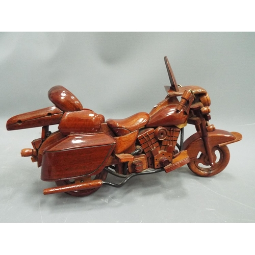 386 - Wooden model of a V Twin Motorcycle. Approx 10 inches long. See photo