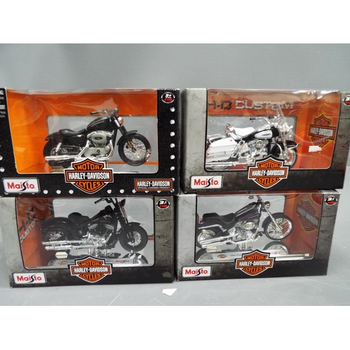 391 - Four 1:18 die cast models of Harley Davidson Motorcycles. All boxed and unused. See photo