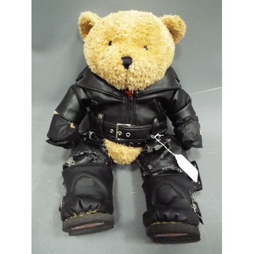 399 - Large Teddy bear dressed in Harley Davidson branded clothes. Approx 16 inches tall. See photos