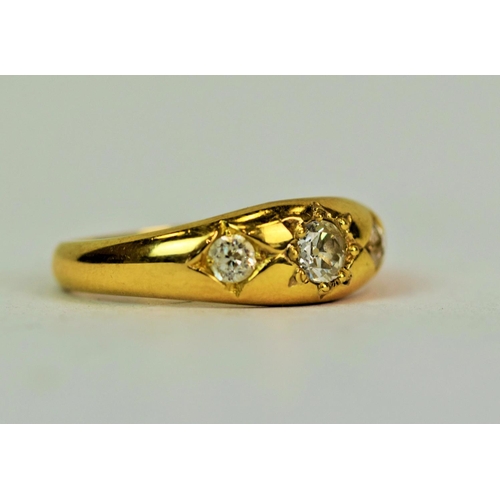 566 - 18ct Yellow Gold ring set with Three Diamonds. Large centre Diamond is approx 0.20 cts with flanking... 