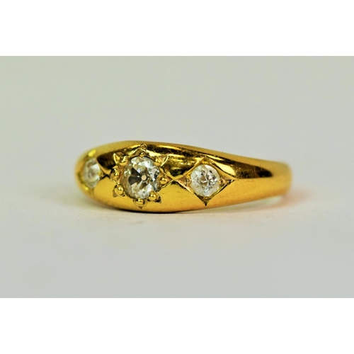 566 - 18ct Yellow Gold ring set with Three Diamonds. Large centre Diamond is approx 0.20 cts with flanking... 