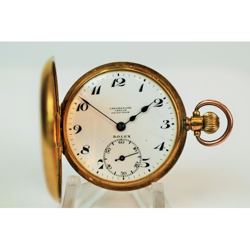 604 - Rolex half Hunter Pocket watch . 17 jewel movement, crown wind, 9ct gold case.  Enamel face with sub... 