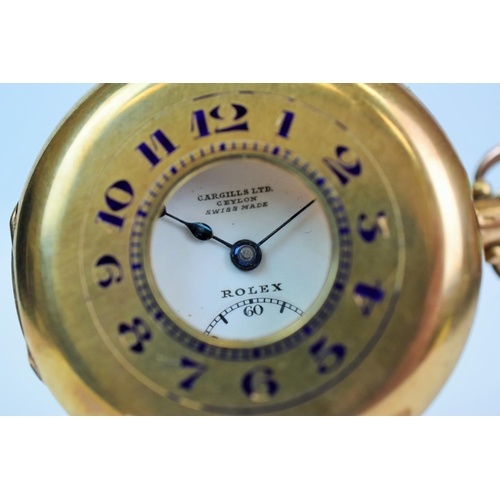 604 - Rolex half Hunter Pocket watch . 17 jewel movement, crown wind, 9ct gold case.  Enamel face with sub... 