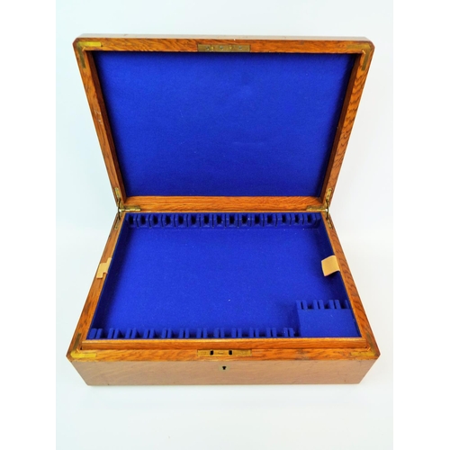 611 - Oak velvet lined cutlery box with close fitting interal drop in trays. Flush recessed brass handles.... 