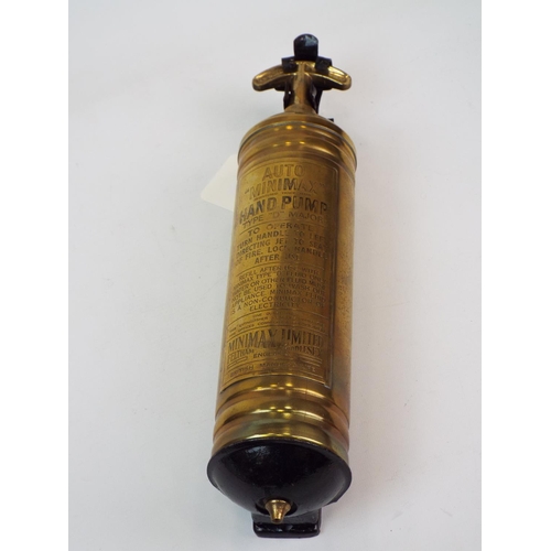 670 - Vintage auto mini max hand pump fire extinguisher with wall mount.