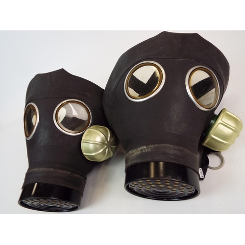 688 - 2 Vintage Henley gas masks.