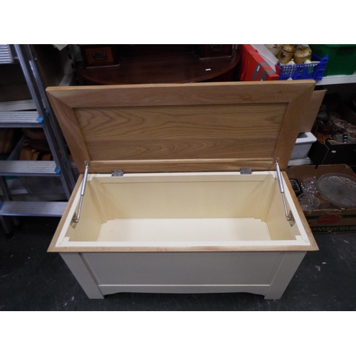 1001 - Modern Blanket box with natural wood lid and painted body. Gas struts to lid. In excellent order. Se... 