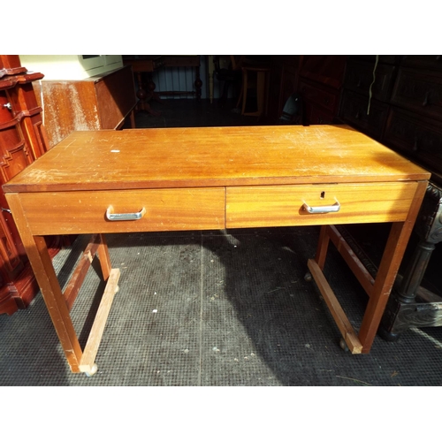 919 - Two drawer table on castors. H:29 x W:40 x D:20 inches. See photo