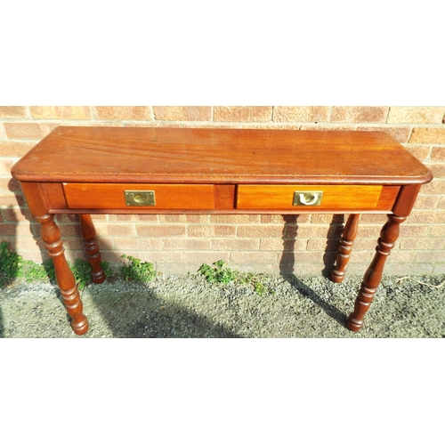 930 - Vintage Reception hall table with drawers under which have recessed brass handles. Stands on turned ... 