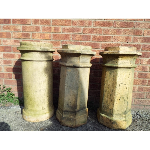 932 - Three old earthenware chimney pots to make good garden planters. Each approx 27 inches tall. See pho... 