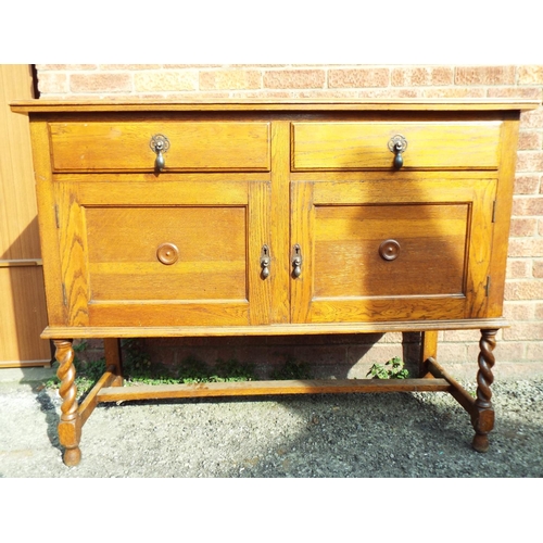 933 - 1930's Oak dresser with two drawers. Barley twist legs to front.  H:37 x W:48 x D:19 inches . See ph... 