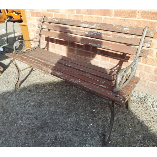 934 - Garden bench with iron supports and wooden lats. W:48 inches see photos.