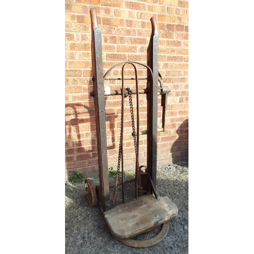 935 - Old porters barrow made from Iron with pulley lift. Has BBCM stencilled into framework. Has some woo... 