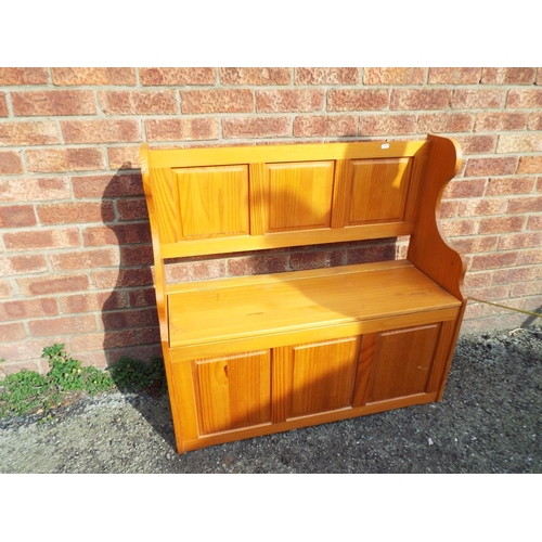 937 - Pine settle style blanket box/seat. H:34 x W:35 x D:14.  See photos.