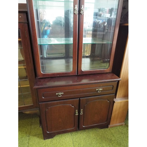 949 - Darkwood cupboard with mirror backed glass fronted display cupboard . H:75 x W:33 x D:18 inches. See... 