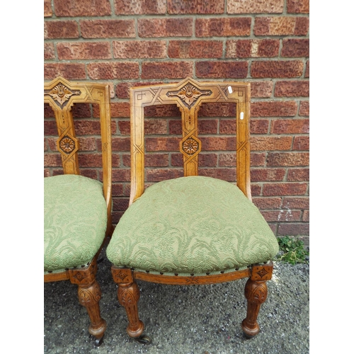 952 - Set of five carved light oak dining chairs with turned legs and spats. Upholstered in a green materi... 