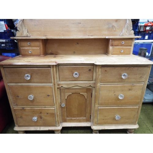 972 - Antique pine chest of drawers. Three drawers to each side with cupboards to centre. Attractive match... 