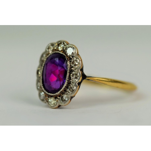 516a - 18ct Yellow Gold Ring set with large oval Amethyst (8 x 6 mm) and surrounded by 12, 1/100th Melee Di... 