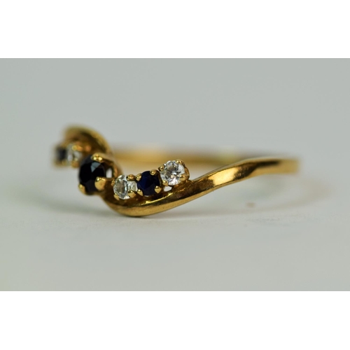 505a - 9ct Yellow Gold ring set with Sapphires and CZ's. Finger size 'O' 1.1g