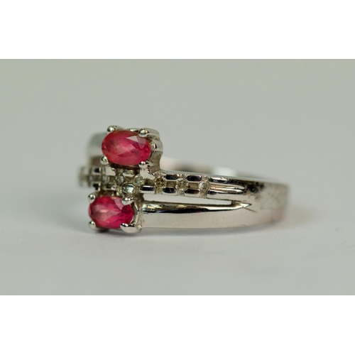 513a - 9ct White Gold Ring set with Tourmaline and nine Melee Diamonds.  Finger size 'L'   3.3g