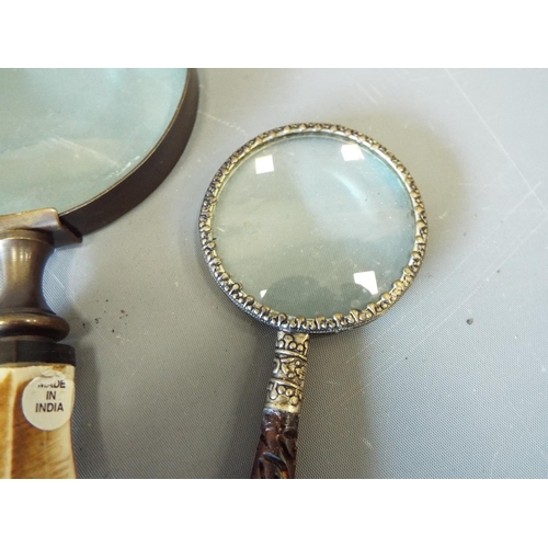 798 - 2 X Vintage magnifying glasses.