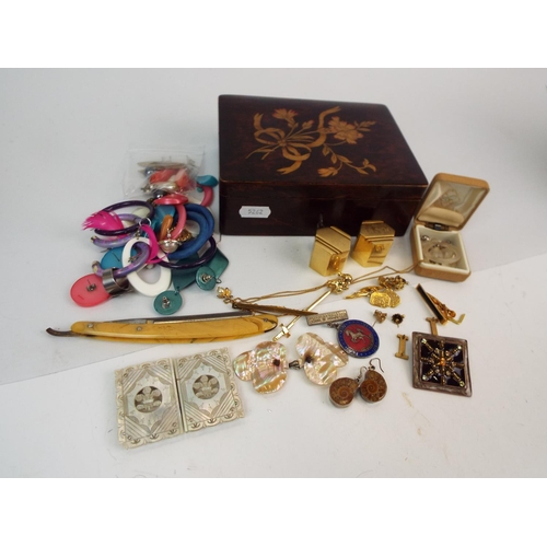 866 - Good mix of costume jewelley including 9ct gold bell earrings , Mop belt buckles etc.