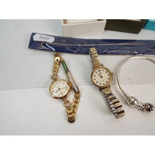 874 - 2 Vintage ladies watches and a sterling silver necklace, bracelets etc.