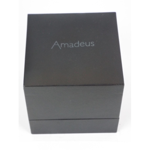 886 - Boxed Amadeus watch in working condition.