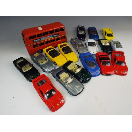 1245 - A Vintage tin bus and a variety of 1:40 diecast cars.