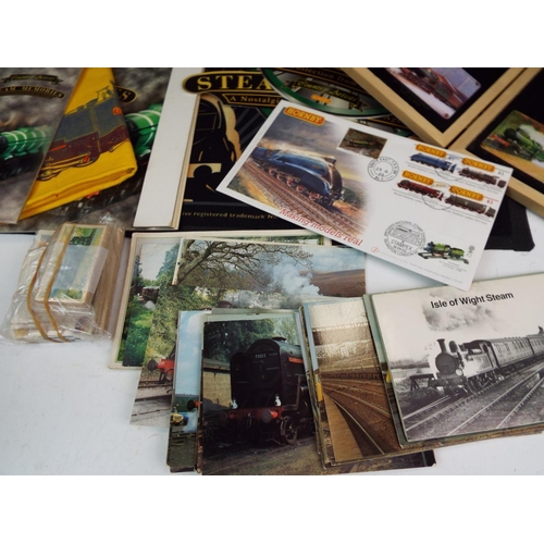 1254 - Large selection of railway related items, dusters, plaques, postcards etc.