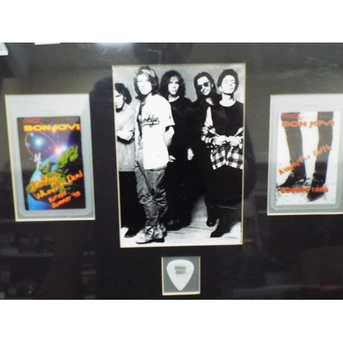 1079 - Framed collage of Bon Jovi items to include Guitar pick. See photo