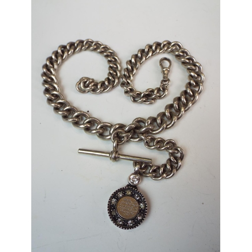 542a - Large and heavy Albert watch chain with graduated links. Tee bar and interesting gem set fob. Each l... 