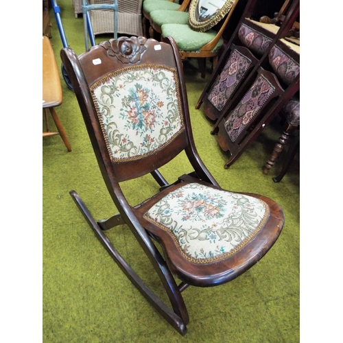 147 - Fold down Gypsy Rocking chair. Upholsterd seat and back. nice condition. C1910