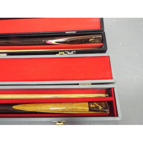 1183 - 2 X Two piece snooker cues and a safety magnetic dart board.