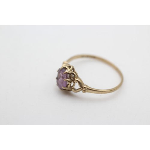 573a - 9ct gold amethyst solitaire ring (1.2g)      221760