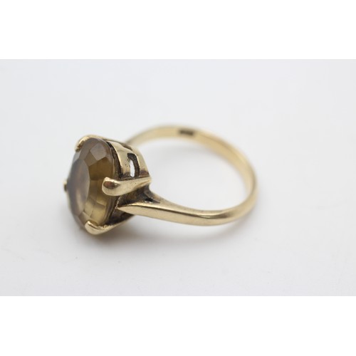 597a - 9ct gold smoky quartz solitaire ring (4.5g)        178718