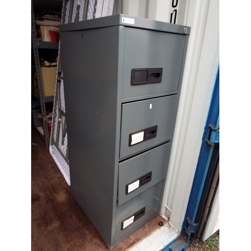 1462 - Large metal four drawer filing cabinet. Key missing. Ideal for garage storage. see photos