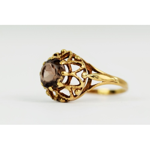 111 - 9ct Yellow Gold Smokey Quartz set ring . Finger size 'O'  2.3g