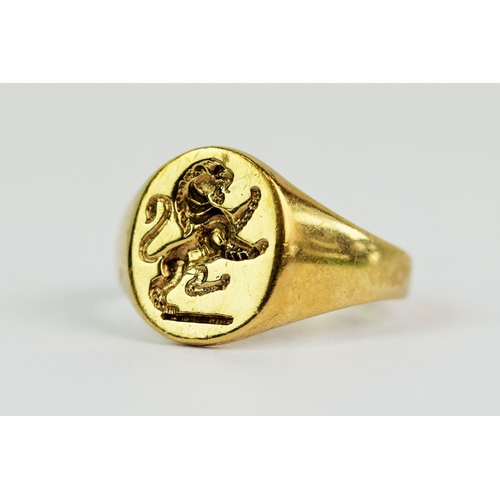 119 - 9ct Yellow Gold Seal ring set with a rampant Tiger, finger size 'X'  7.2g