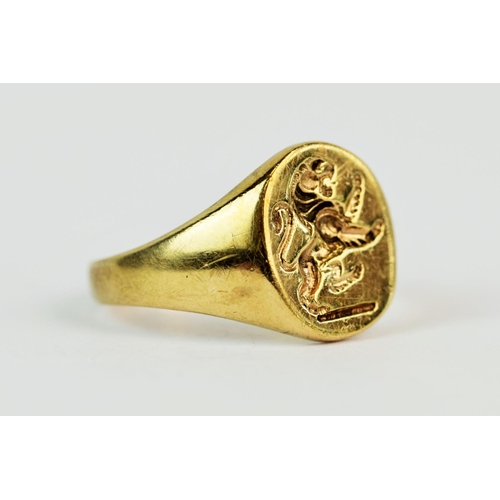 119 - 9ct Yellow Gold Seal ring set with a rampant Tiger, finger size 'X'  7.2g