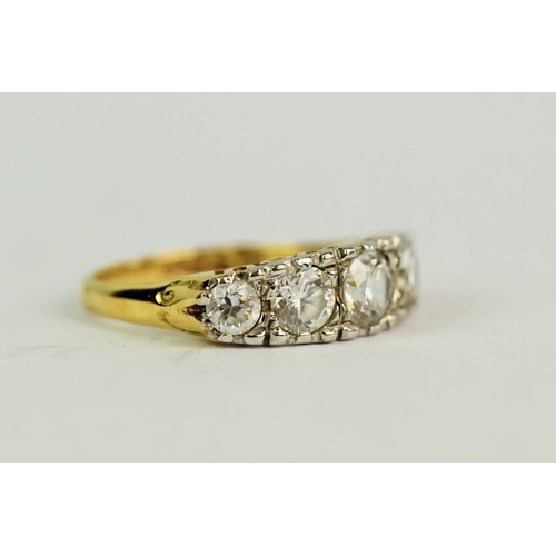 129 - 14ct Yellow Gold ring set with five round CZ   Finger size 'K'   2.7g