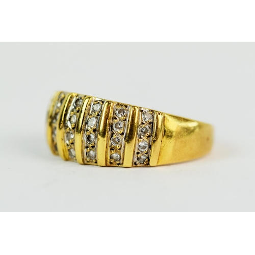 130 - 18ct  Yellow Gold ring set with multi CZ stones. Finger size 'Q'  5.3g