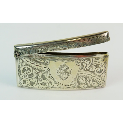 163 - Hallmarked Silver curved Vesta with scrolled decoration.  Approx 85mm long.,   34.0g