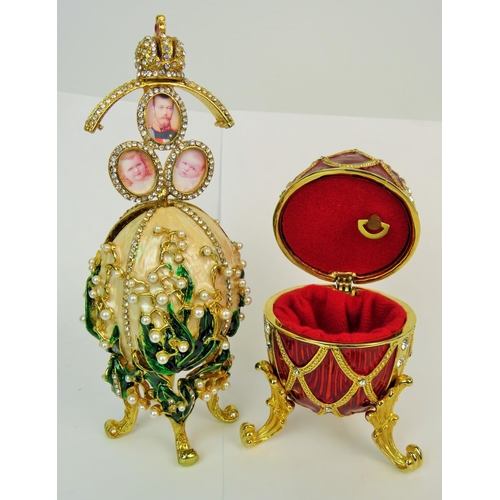 194 - Two Jewel encrusted decorative eggs,  one as a photo frame, the other is a musical jewel casket. Bot... 