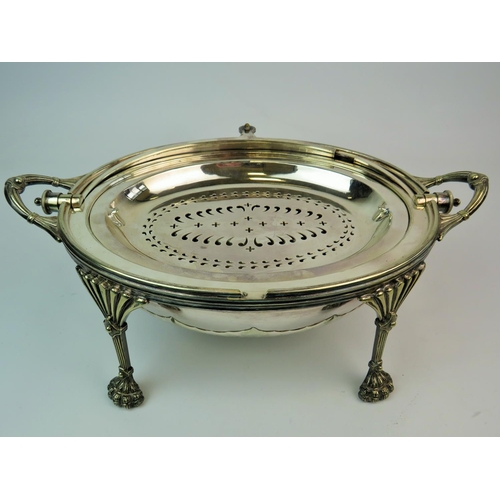 198 - Walker & Hall Silver plate roll top tureen. Raised on Lion paw feet, pierced tray to interior, ceram... 