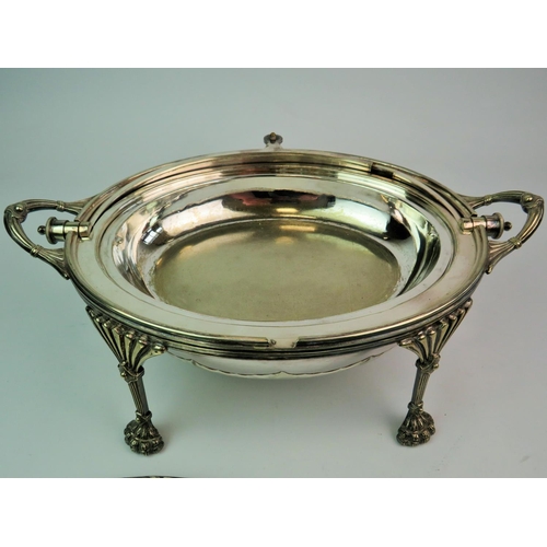 198 - Walker & Hall Silver plate roll top tureen. Raised on Lion paw feet, pierced tray to interior, ceram... 