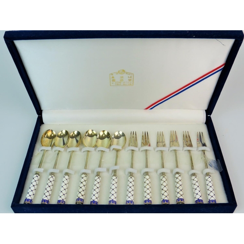 199 - Set of Twelve, oriental made silver and enamel spoons and forks. Original lined box. See photos.