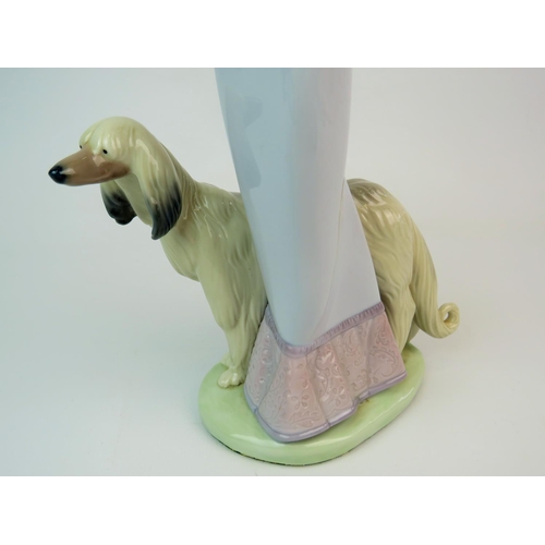 209 - Lladro Figurine 'Stepping Out' Model number 1537,  Measures approx 13.5 inches tall., original box. ... 