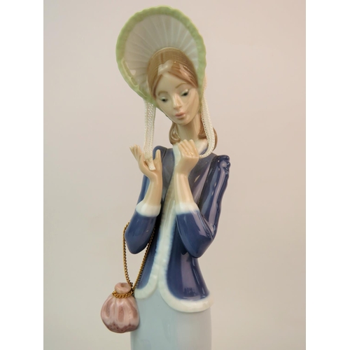 209 - Lladro Figurine 'Stepping Out' Model number 1537,  Measures approx 13.5 inches tall., original box. ... 