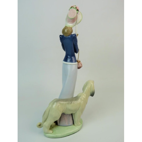 209 - Lladro Figurine 'Stepping Out' Model number 1537,  Measures approx 13.5 inches tall., original box. ... 